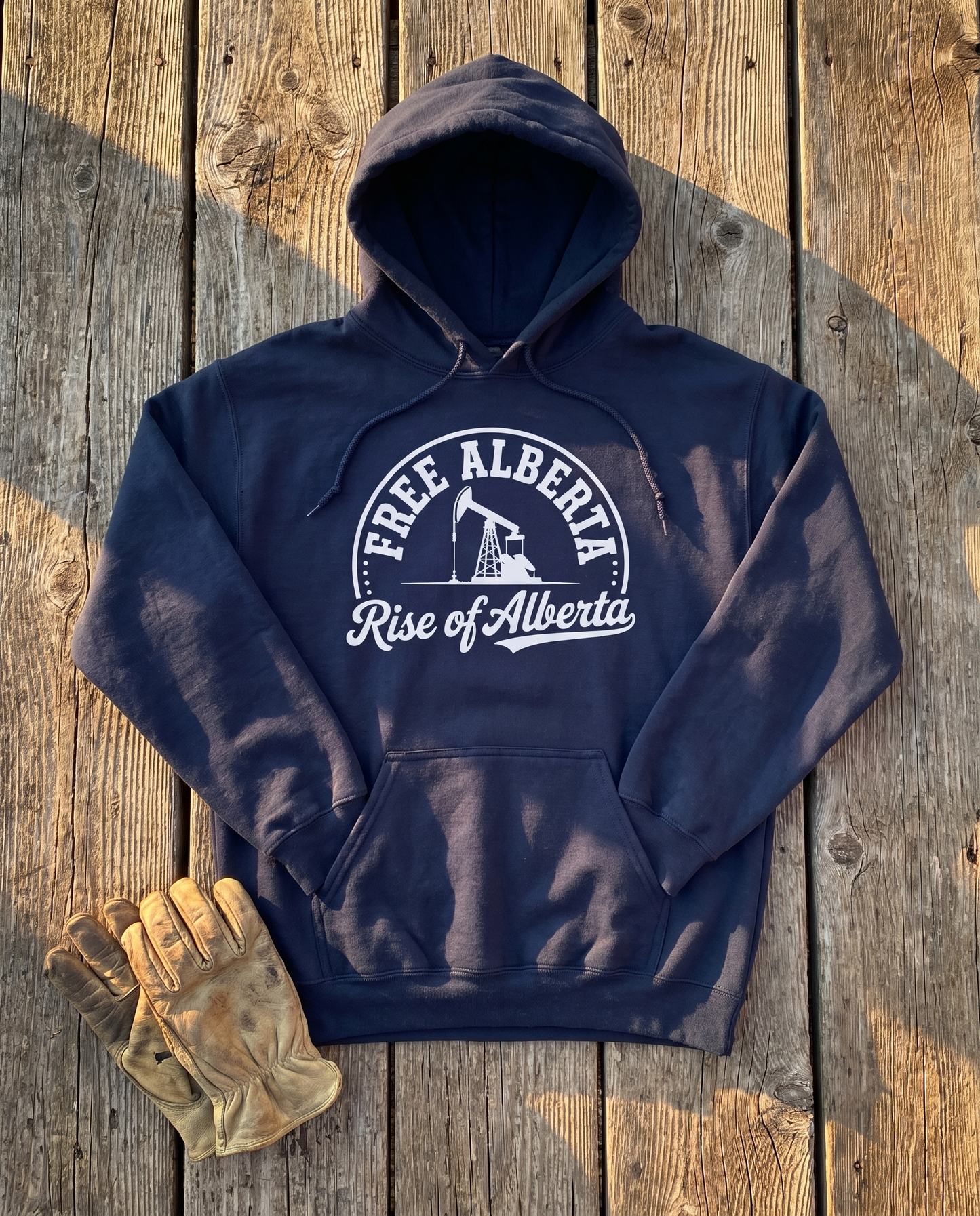 Free Alberta hoodie navy flat lay barn wood