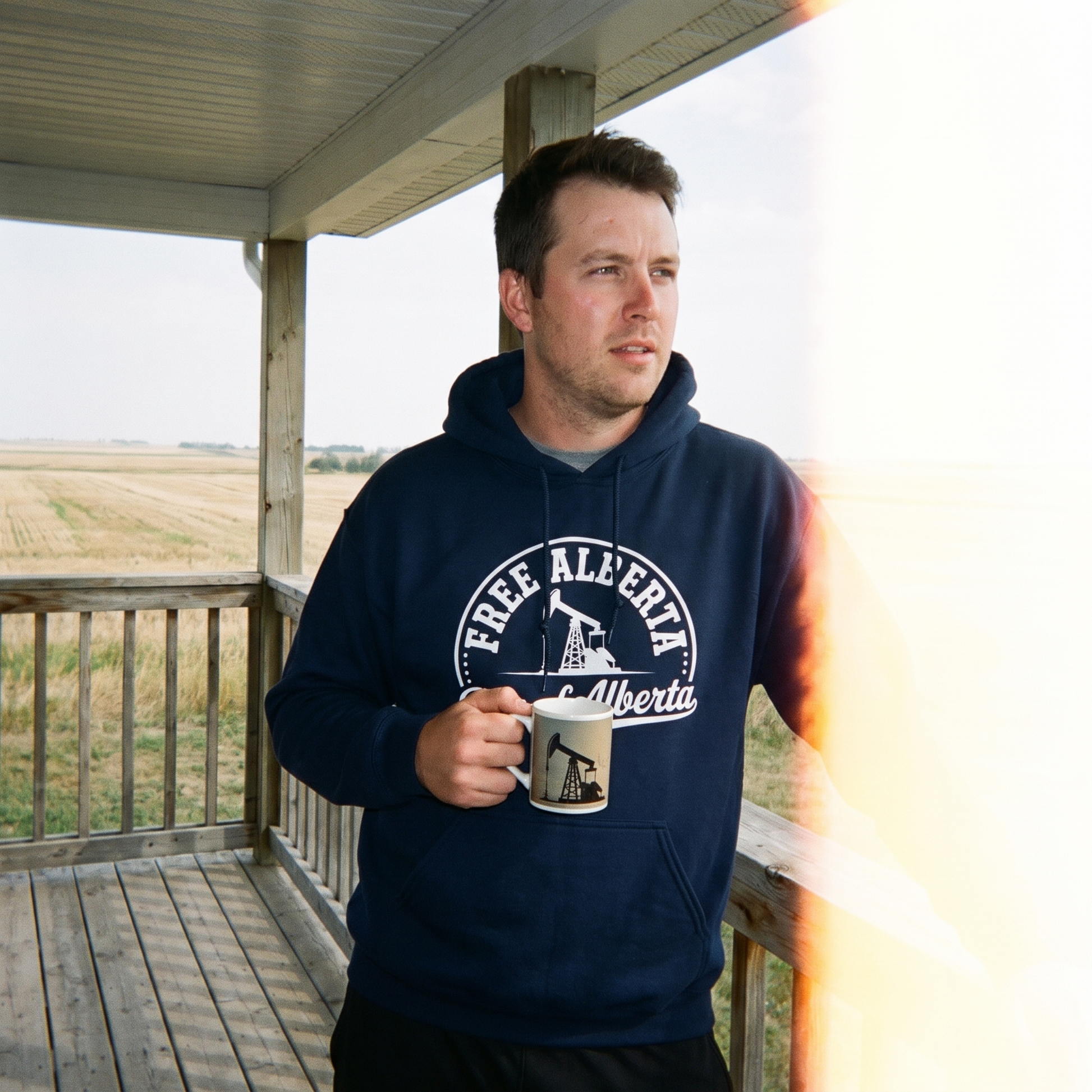 Free Alberta hoodie navy porch lifestyle