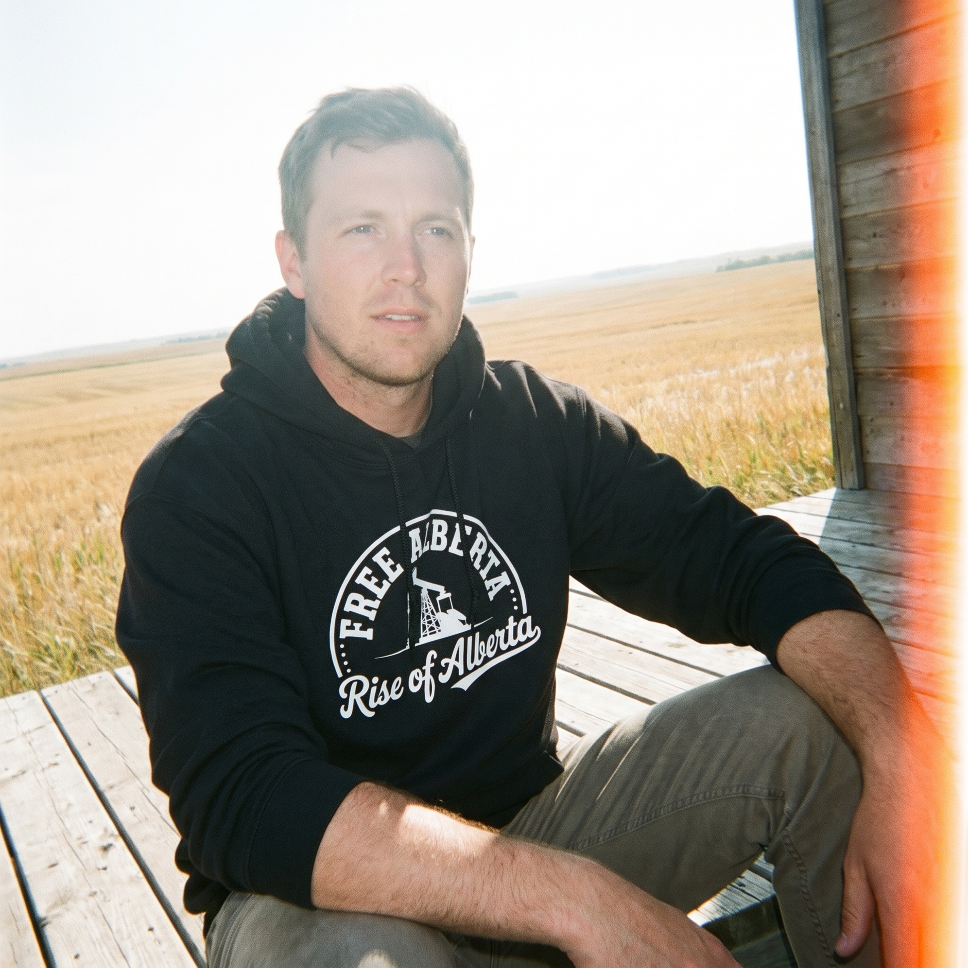 Free Alberta hoodie black porch lifestyle