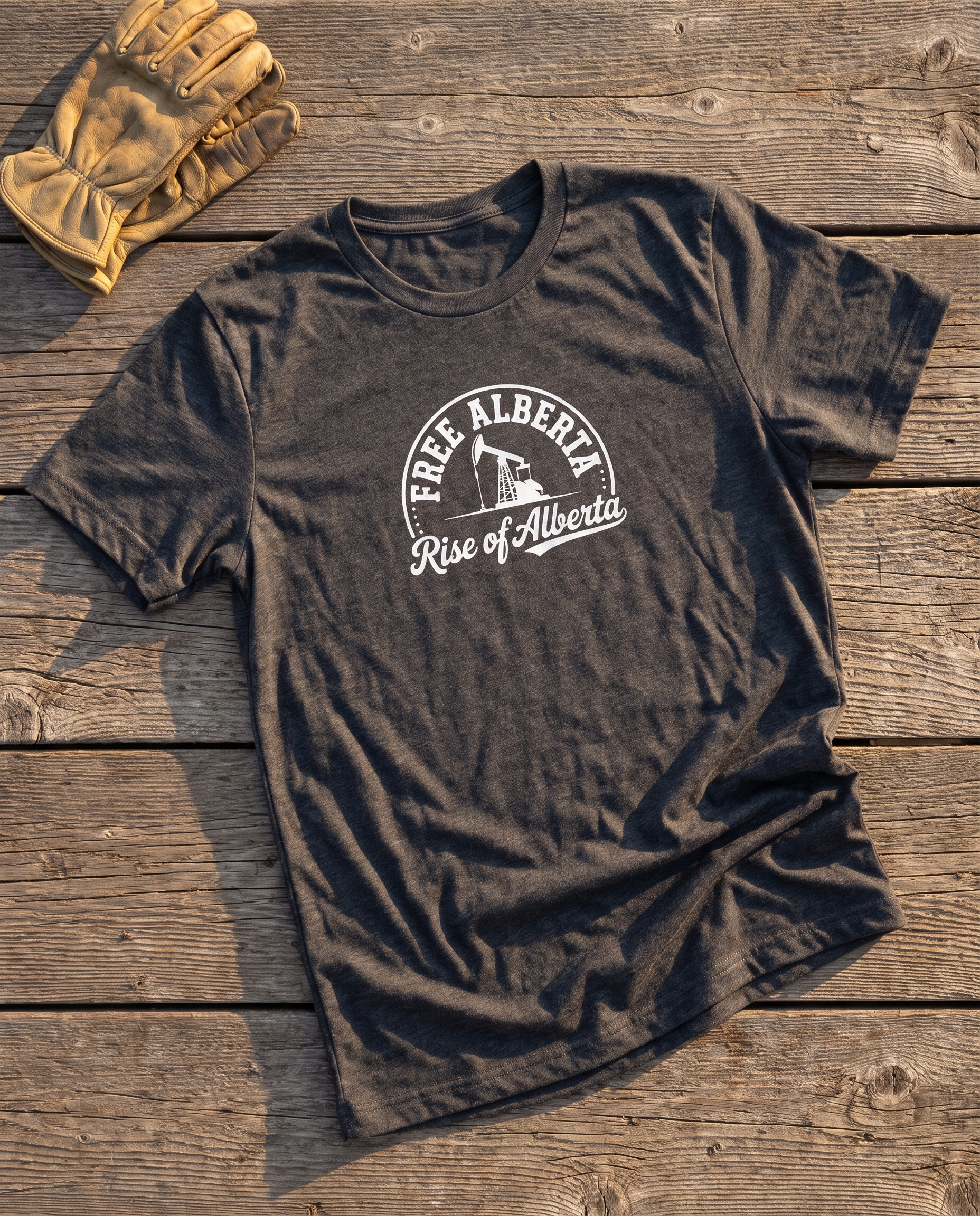 Free Alberta pumpjack tee dark grey heather flat lay barn wood