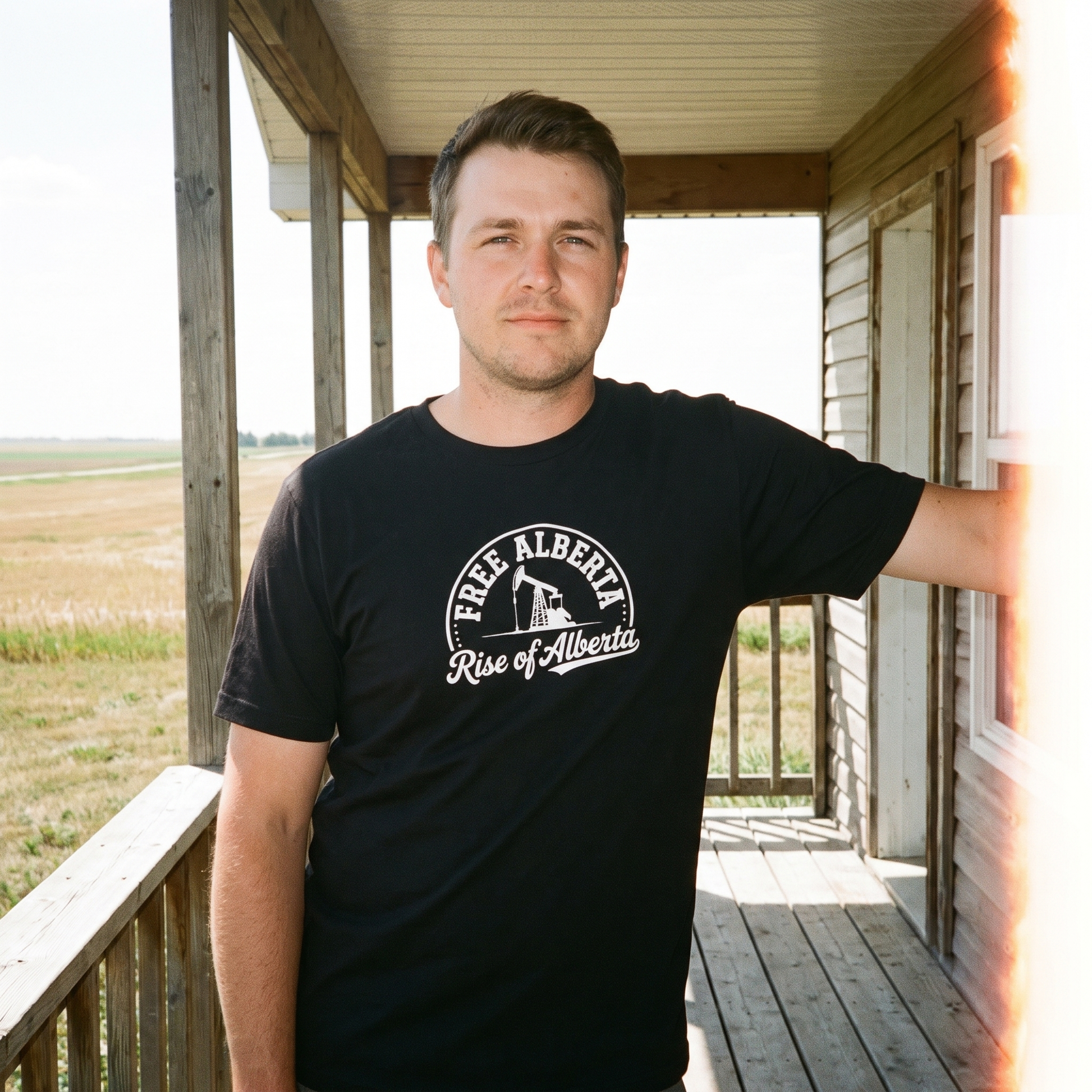 Free Alberta pumpjack tee black porch lifestyle