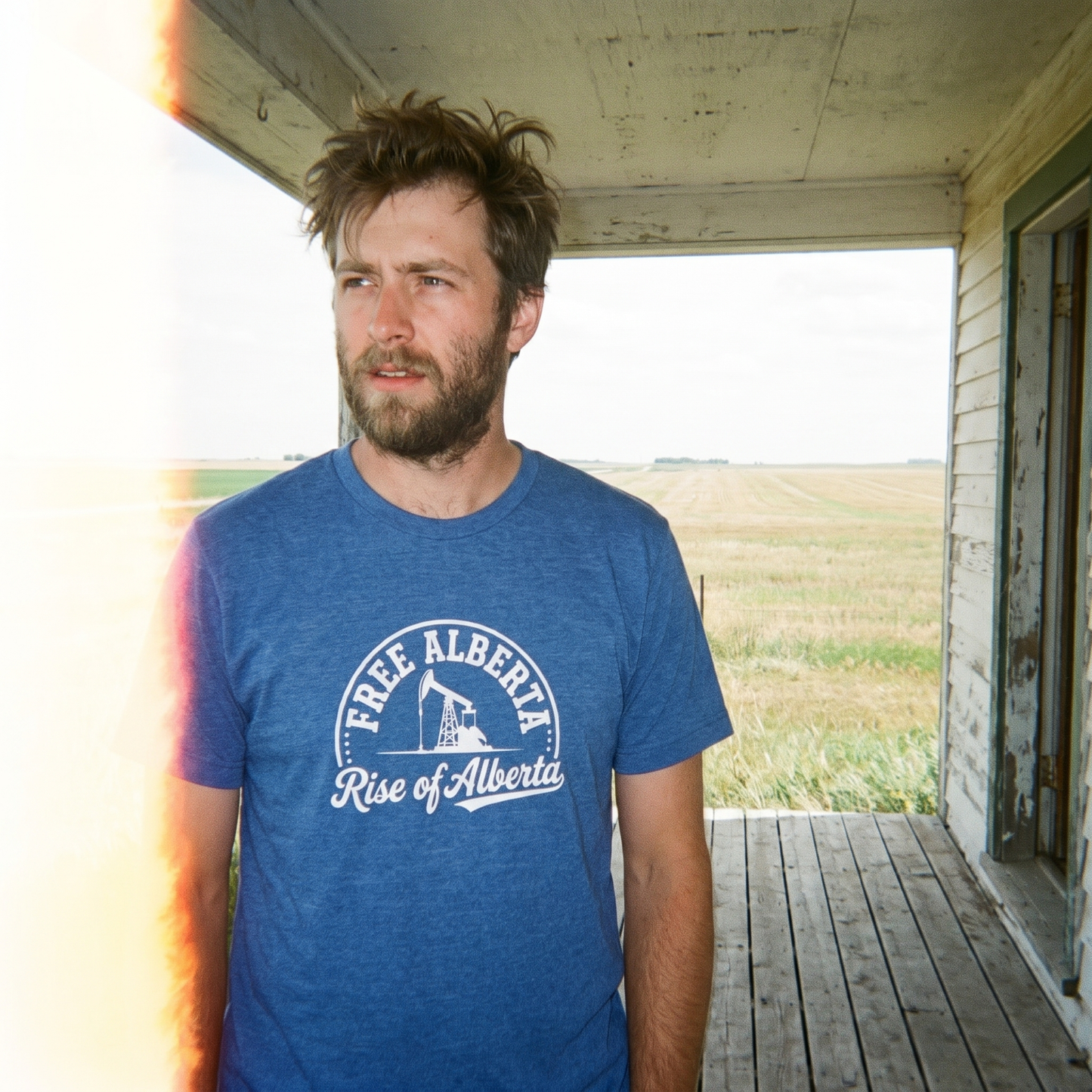 Free Alberta pumpjack tee heather true royal porch lifestyle