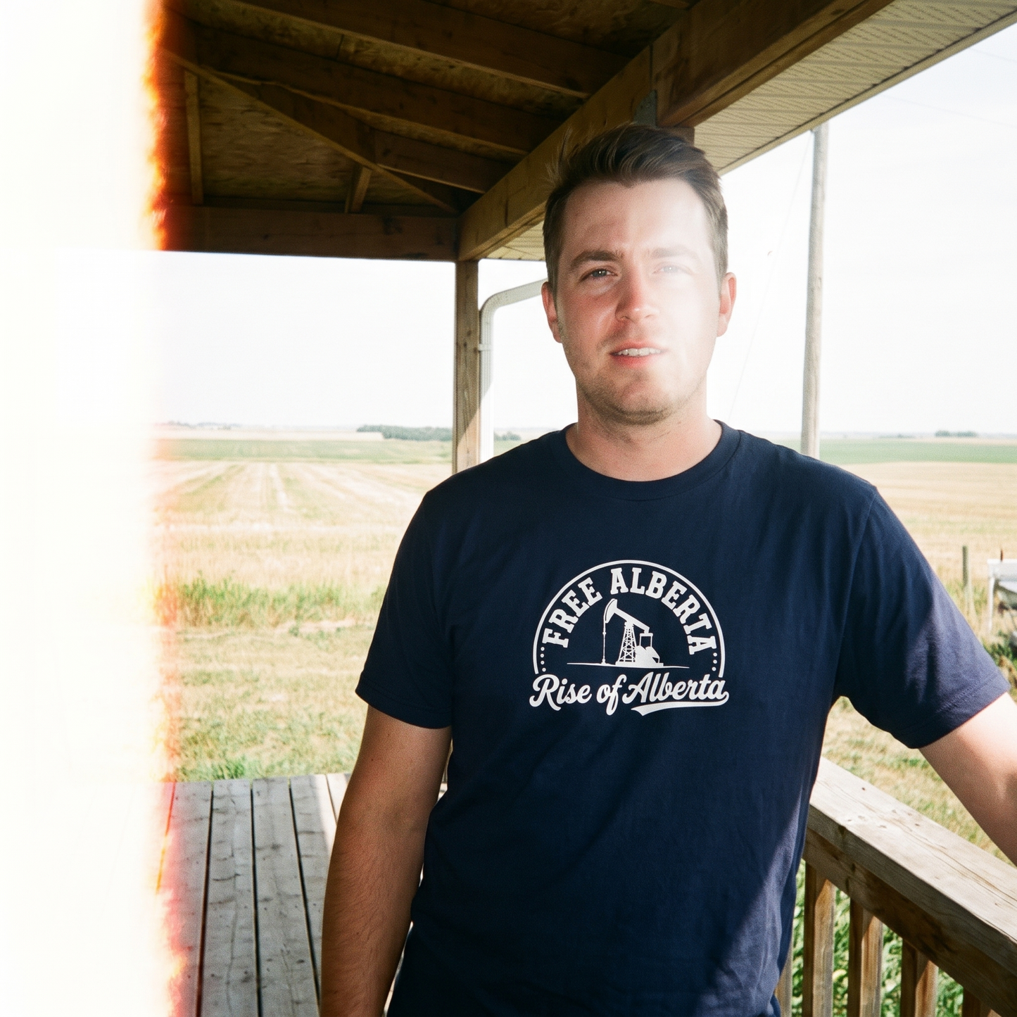 Free Alberta pumpjack tee navy porch lifestyle