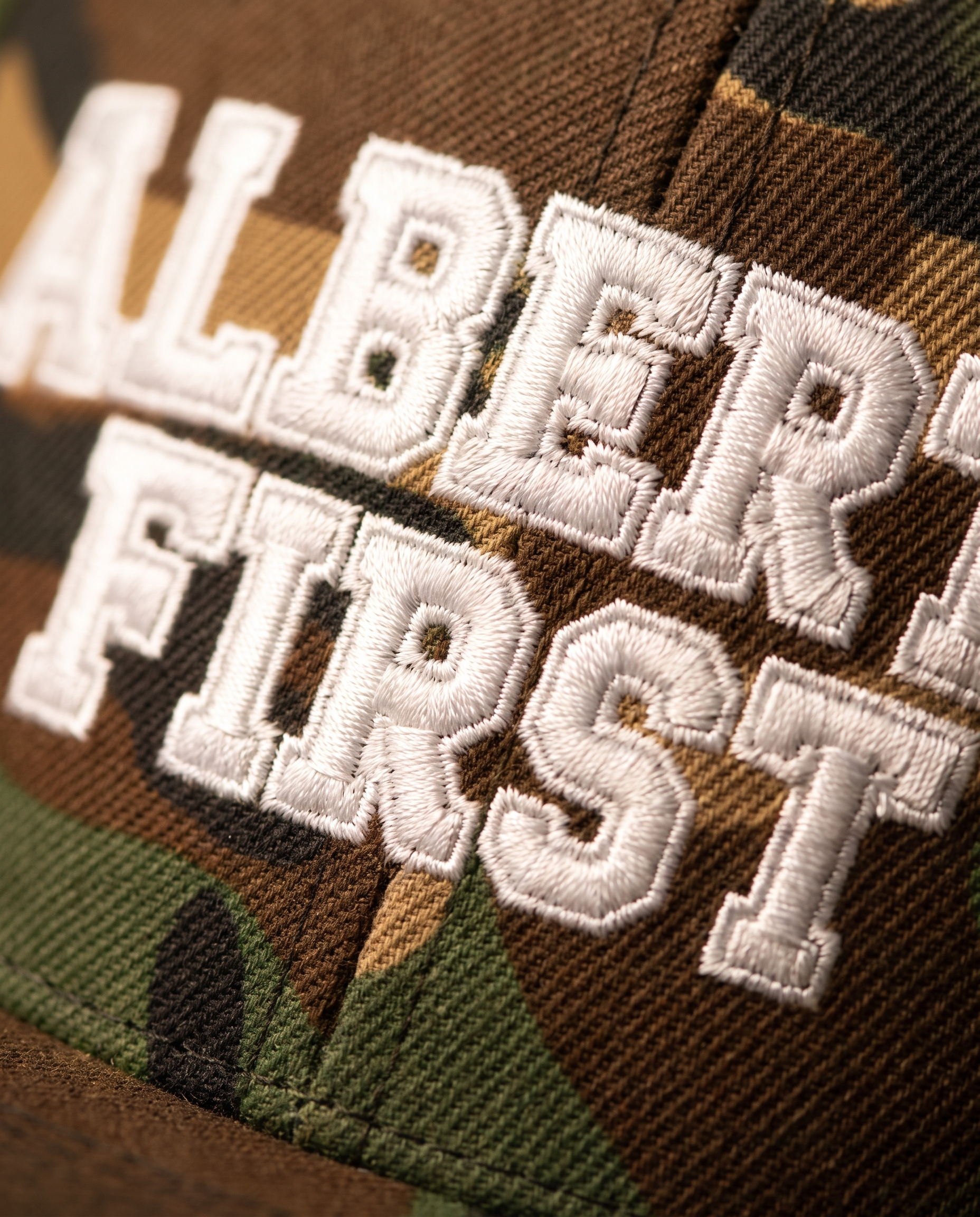 Alberta First snapback embroidered lettering close-up showing stitch detail
