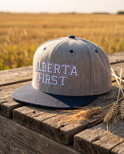 Alberta First embroidered snapback heather grey and navy colorway on barn wood