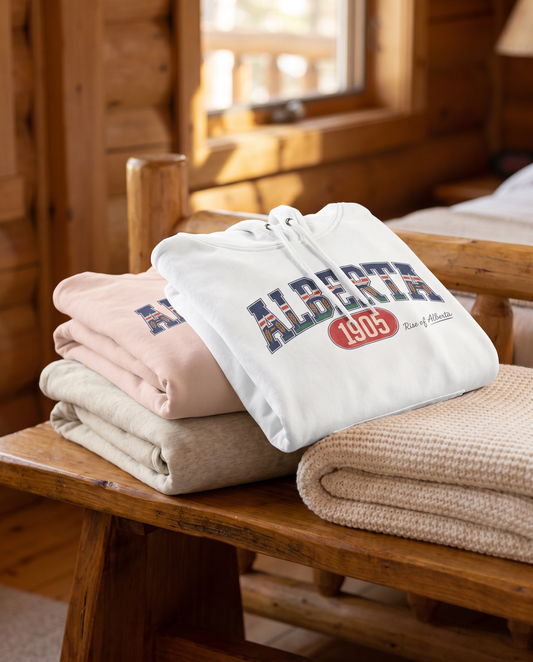 Alberta 1905 fleece hoodie all three colorways folded stack on wooden bench