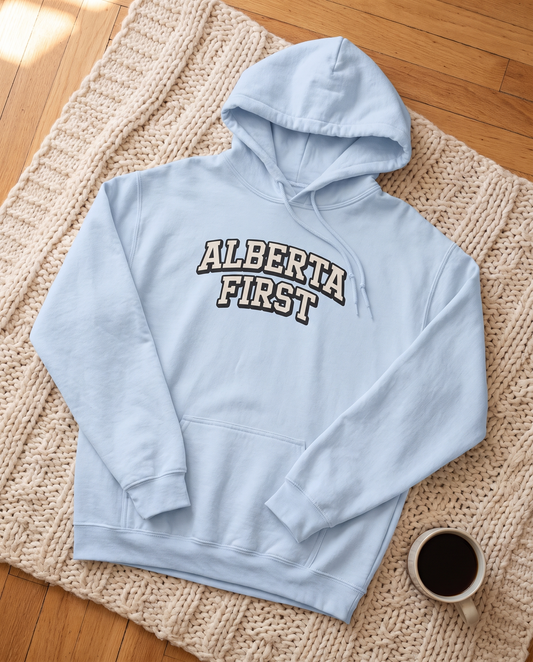 Womens Alberta First varsity hoodie light blue flat lay on knit blanket