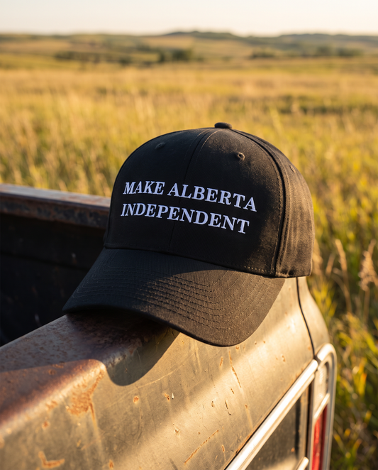Make Alberta Independent embroidered cap black on truck tailgate