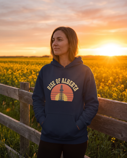 Rise of Alberta Sunrise Hoodie navy at canola field fence line