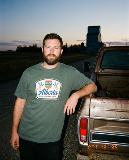 Heritage Tee in Blue Spruce worn at a truck tailgate