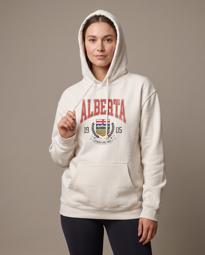 Woman wearing the Alberta Coat of Arms Hoodie oversized with the hood up